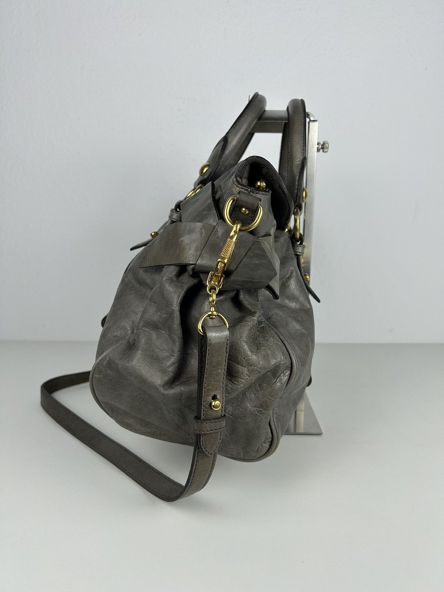 Miu miu vitello bow bag in gray with locket