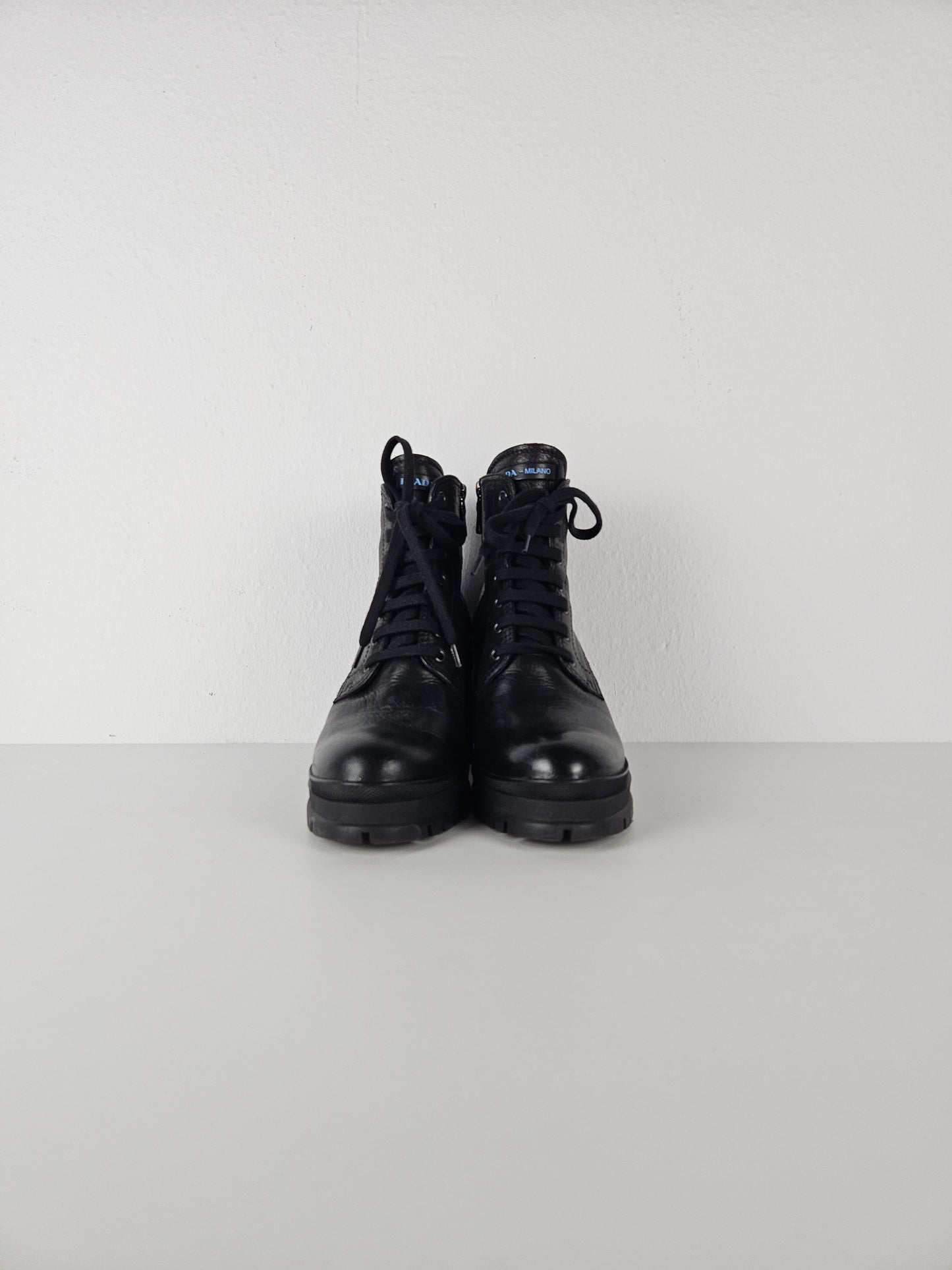 Prada lace up block heel notched sole ankle boots