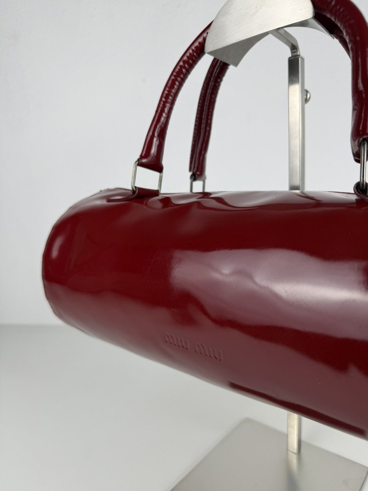 Vintage 90s Miu Miu patent leather cylindrical handbag