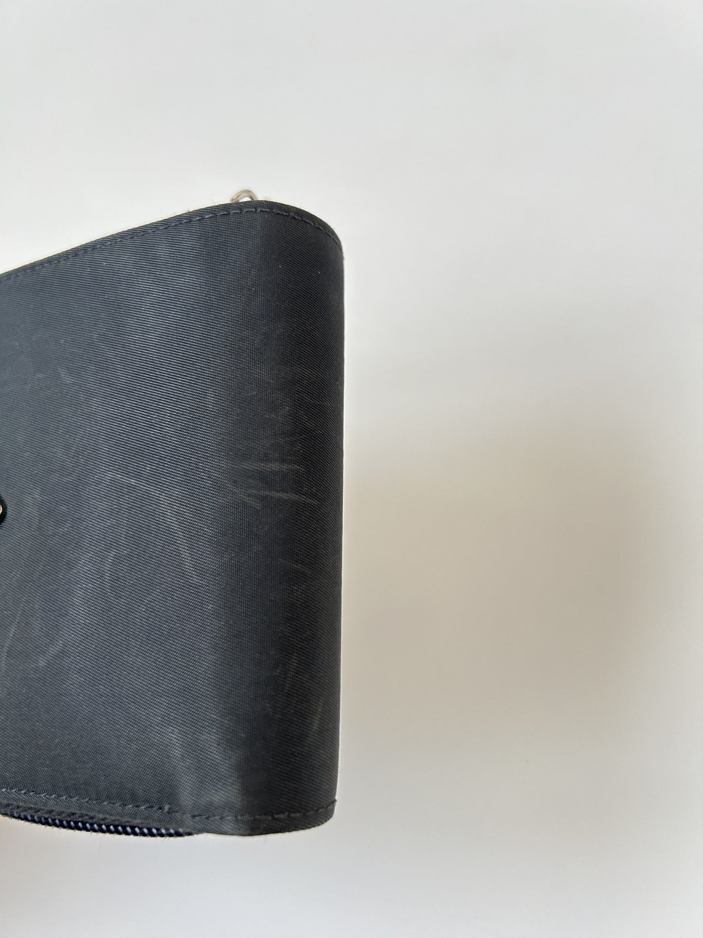 Prada nylon and saffiano leather triangle logo zip wallet