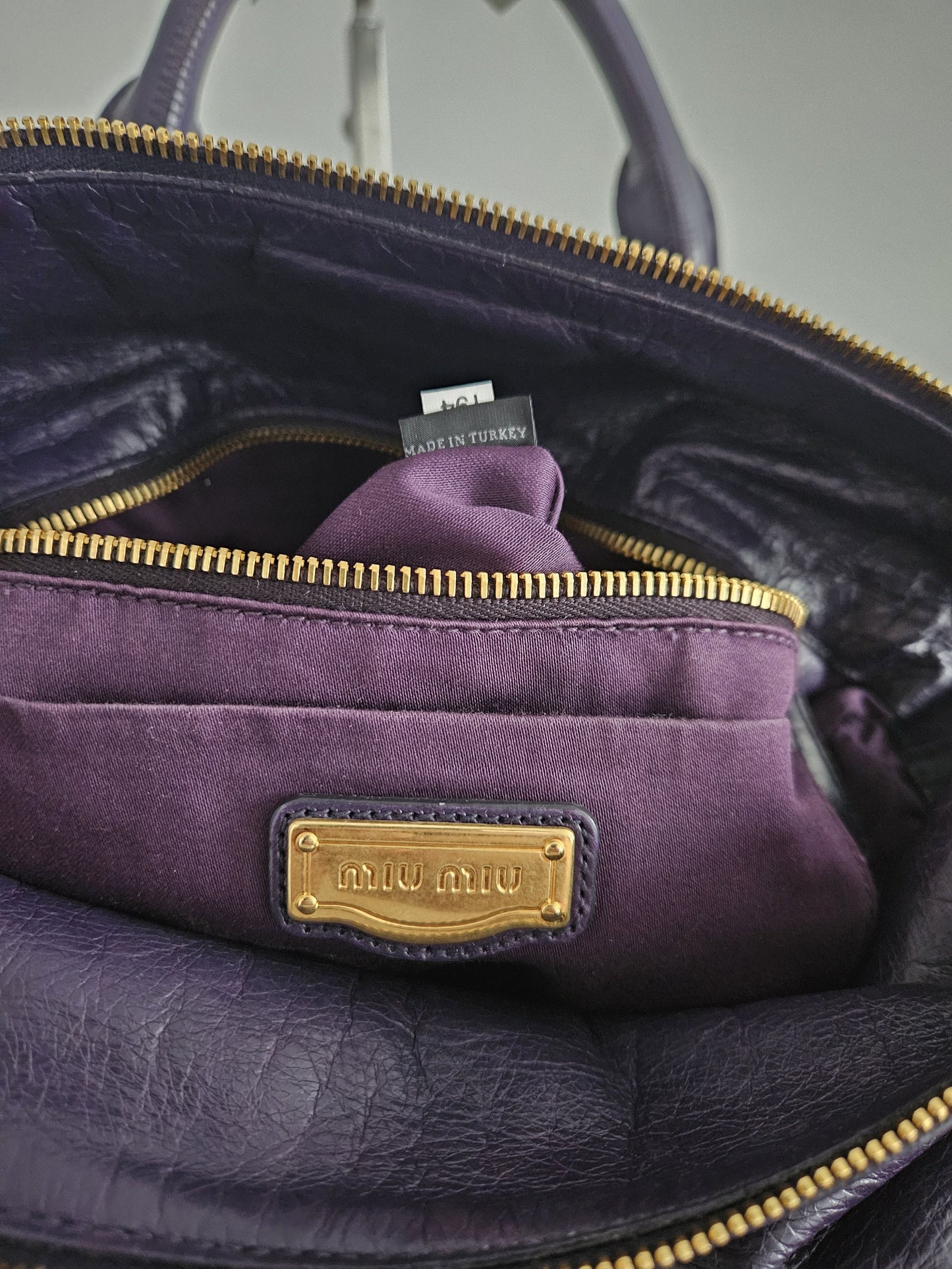Miu miu vitello bow bag in deep purple