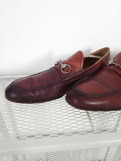 Gucci leather horsebit loafers in distressed red