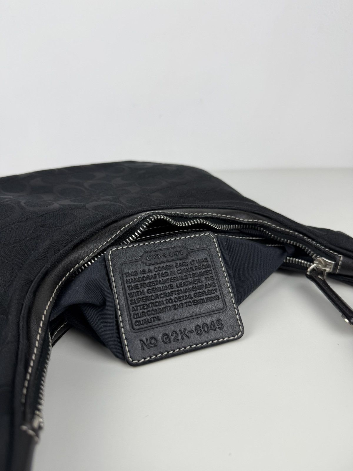 Coach signature jacquard half moon small hobo bag