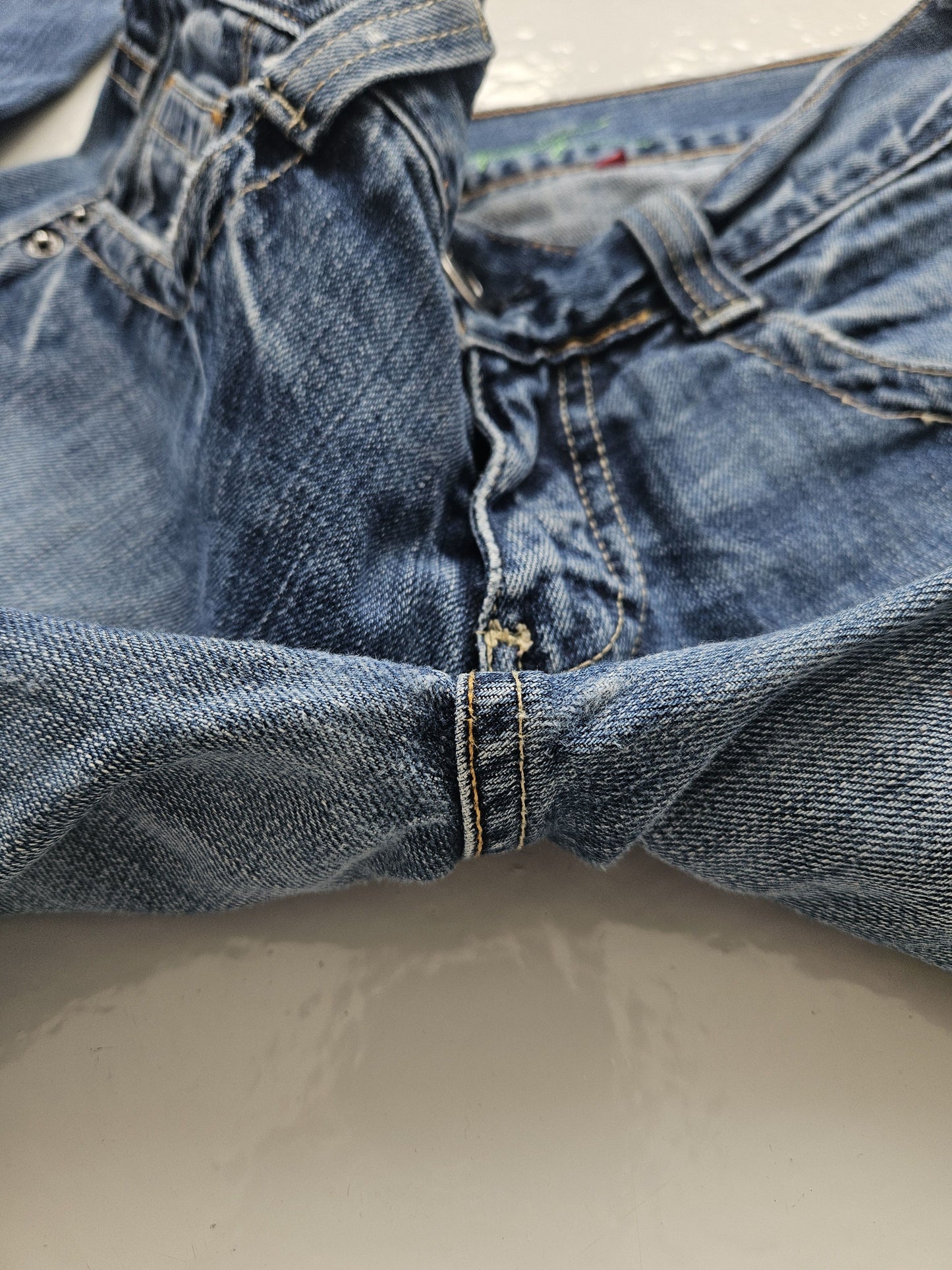 Vintage distressed bootcut low waisted denim