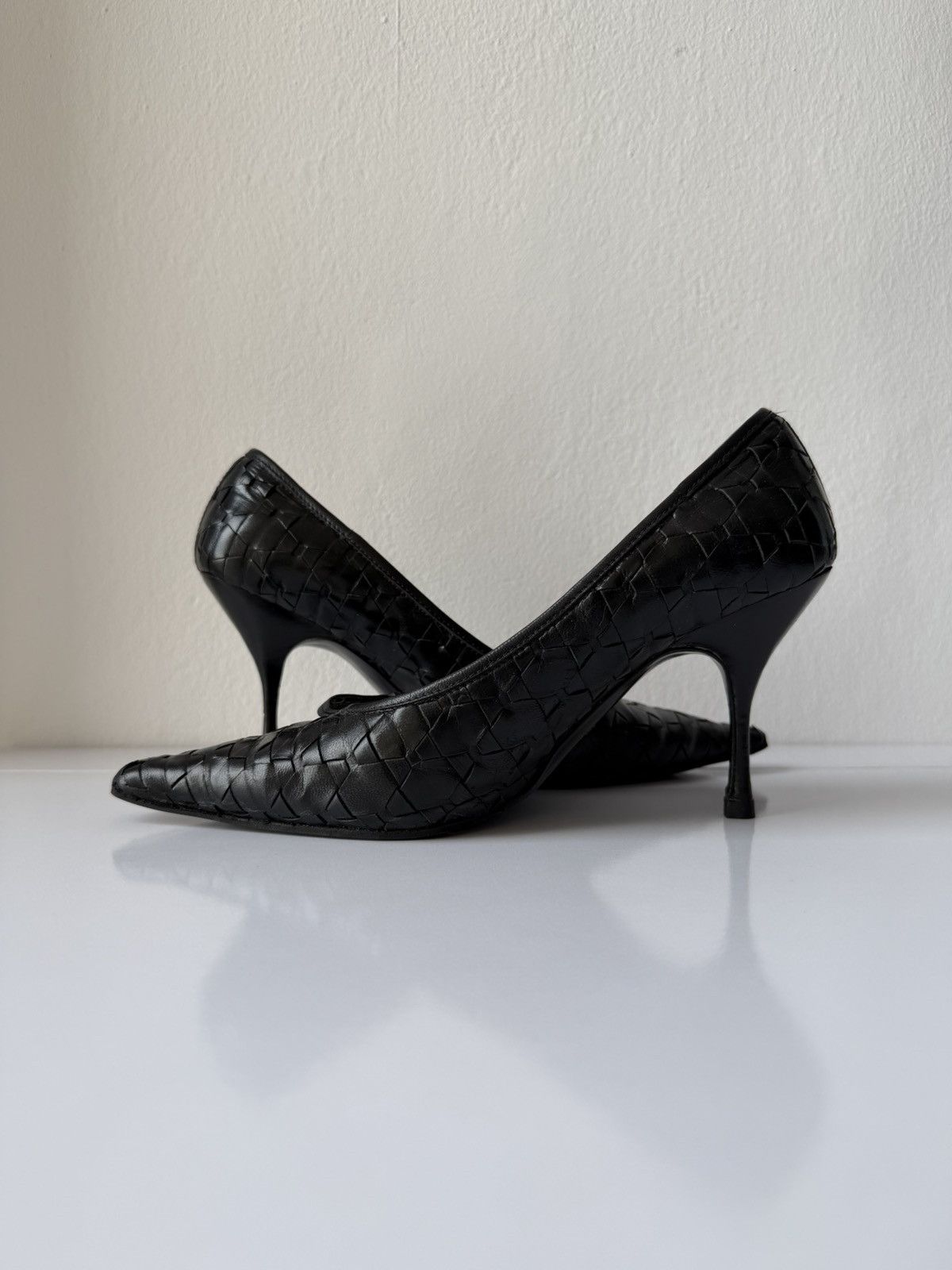 Prada woven leather long toe pumps with bow
