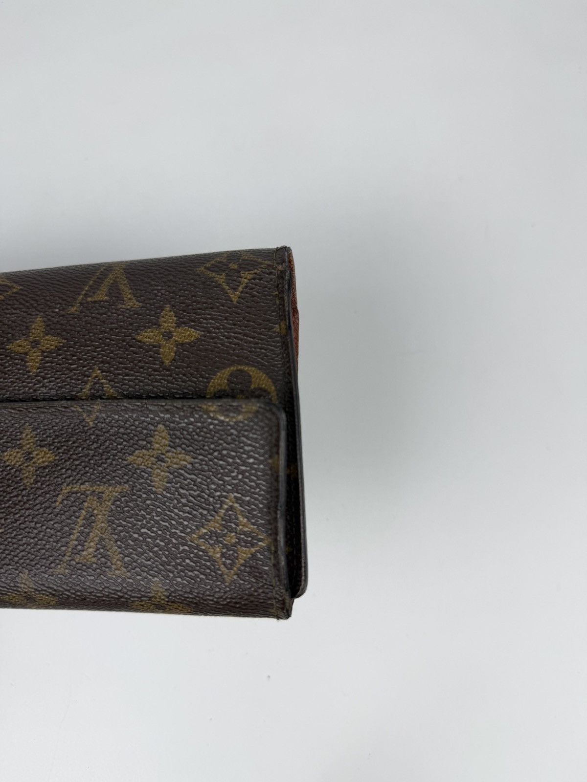 Louis Vuitton porto tresor international trifold wallet
