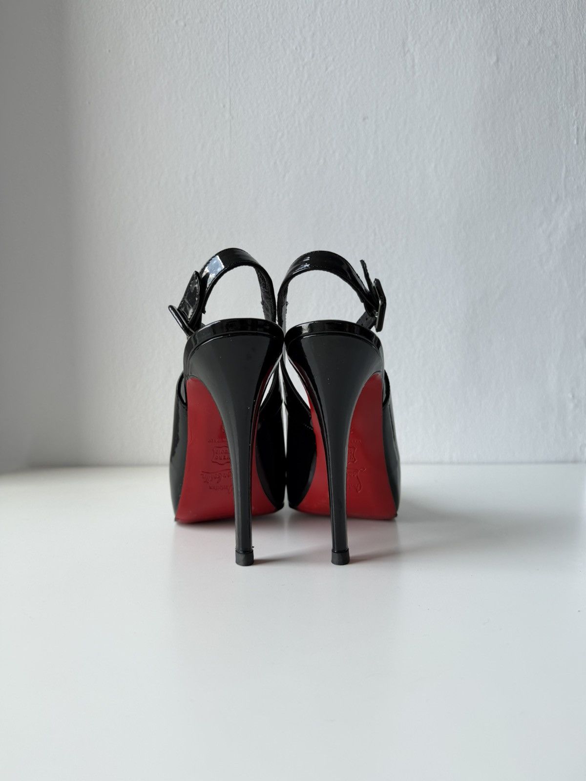 Christian Louboutin Rolande patent leather slingback pumps