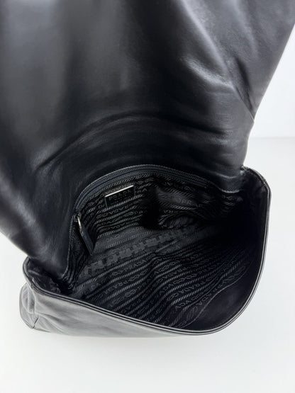 Vintage Prada embossed logo leather shoulder bag