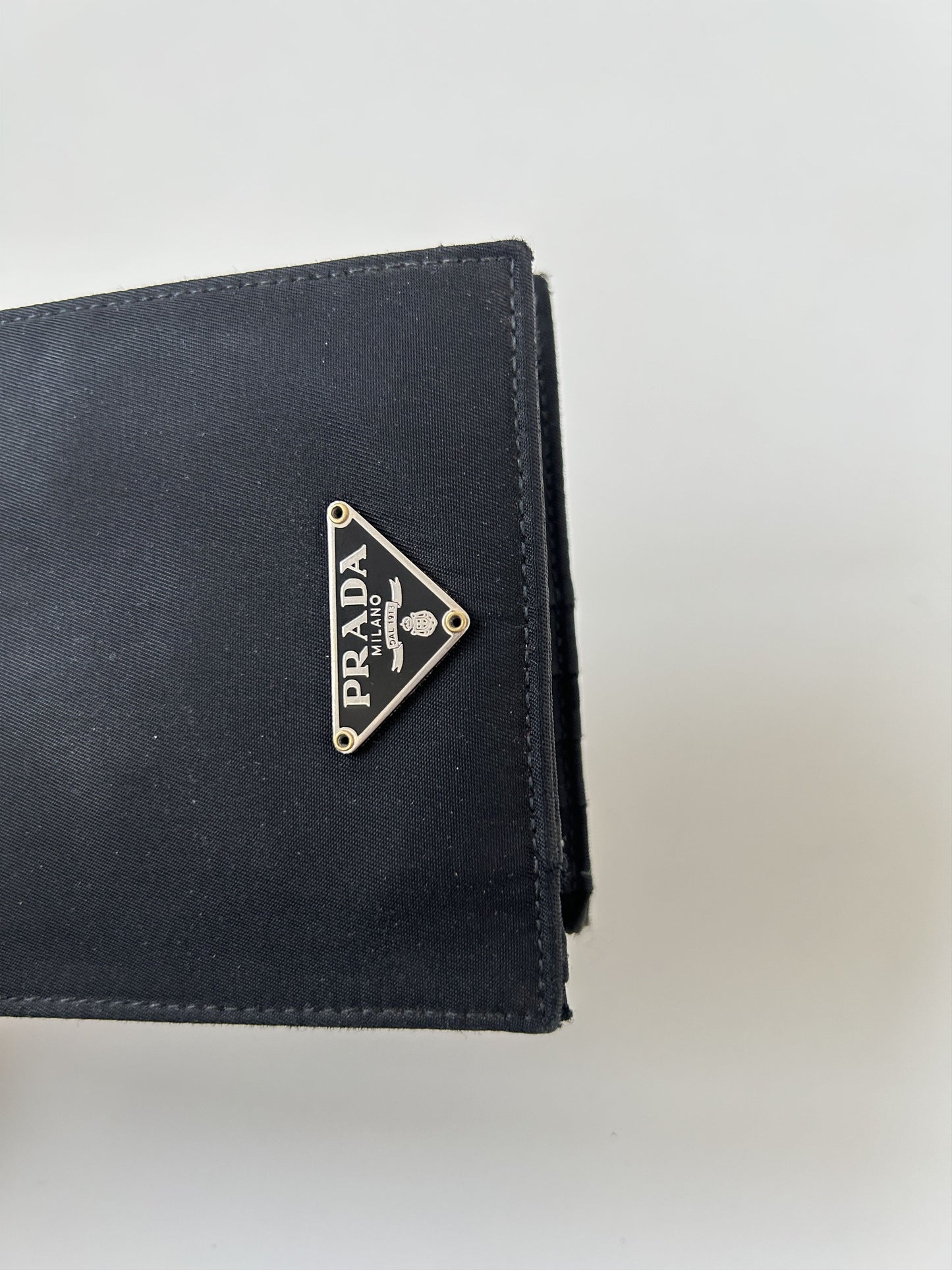 Prada triangle logo nylon bifold wallet