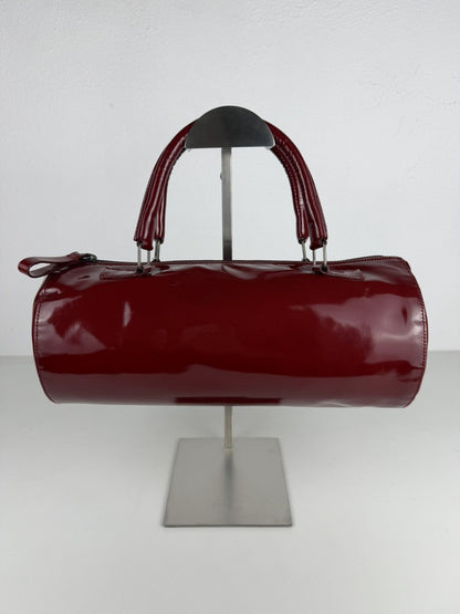 Vintage 90s Miu Miu patent leather cylindrical handbag