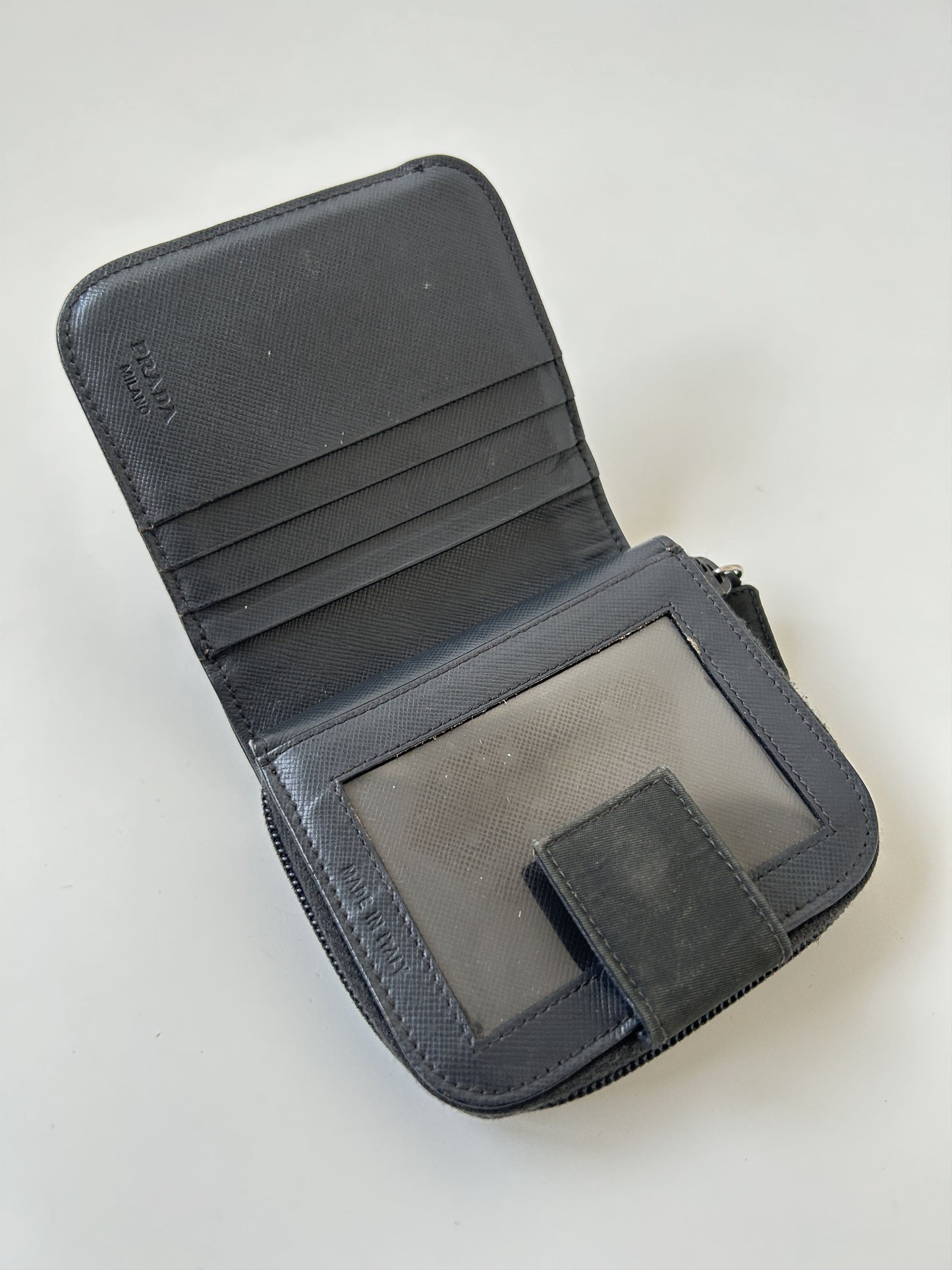 Prada nylon and saffiano leather triangle logo zip wallet