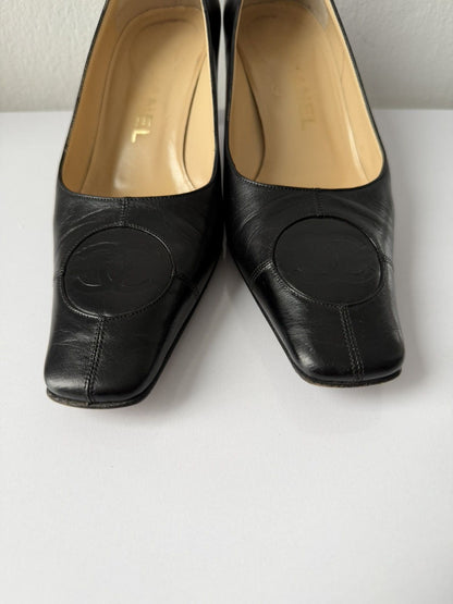 AW2001 Chanel embossed logo long toe leather pumps