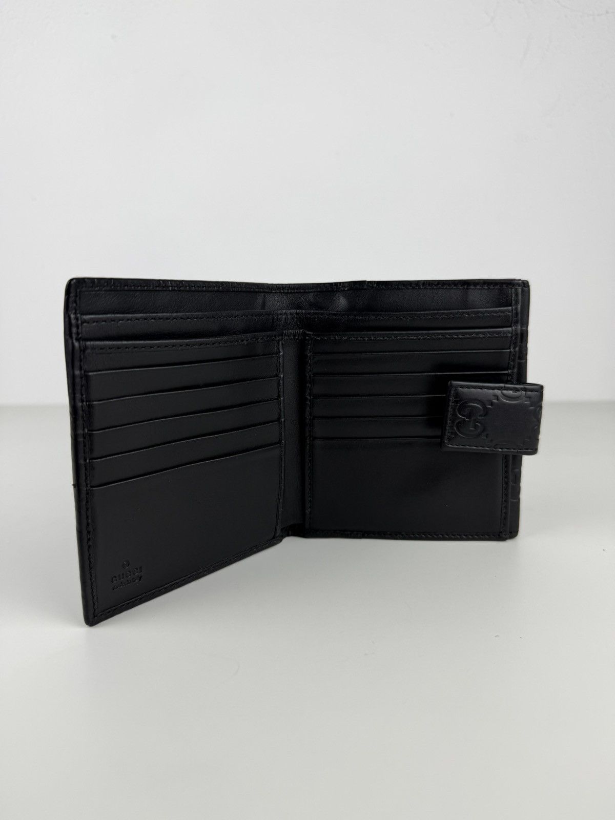 Gucci guccissima leather trifold wallet