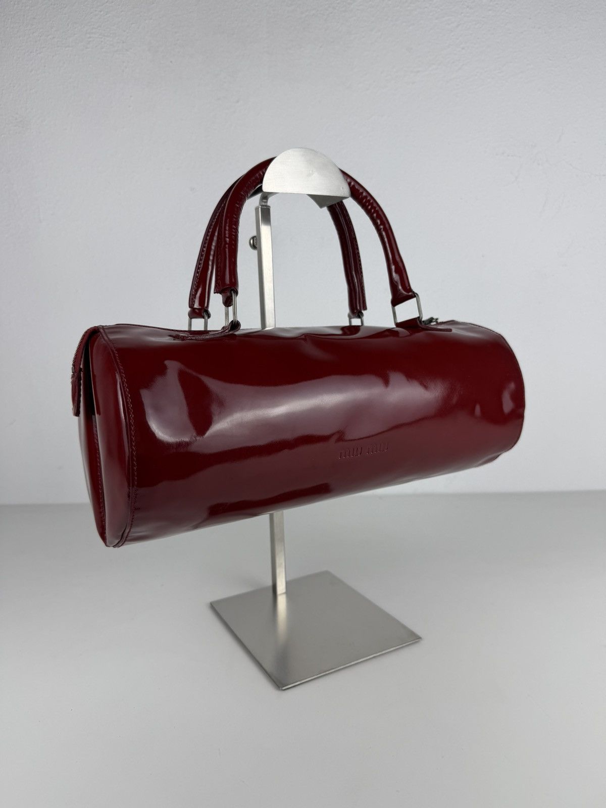 Vintage 90s Miu Miu patent leather cylindrical handbag