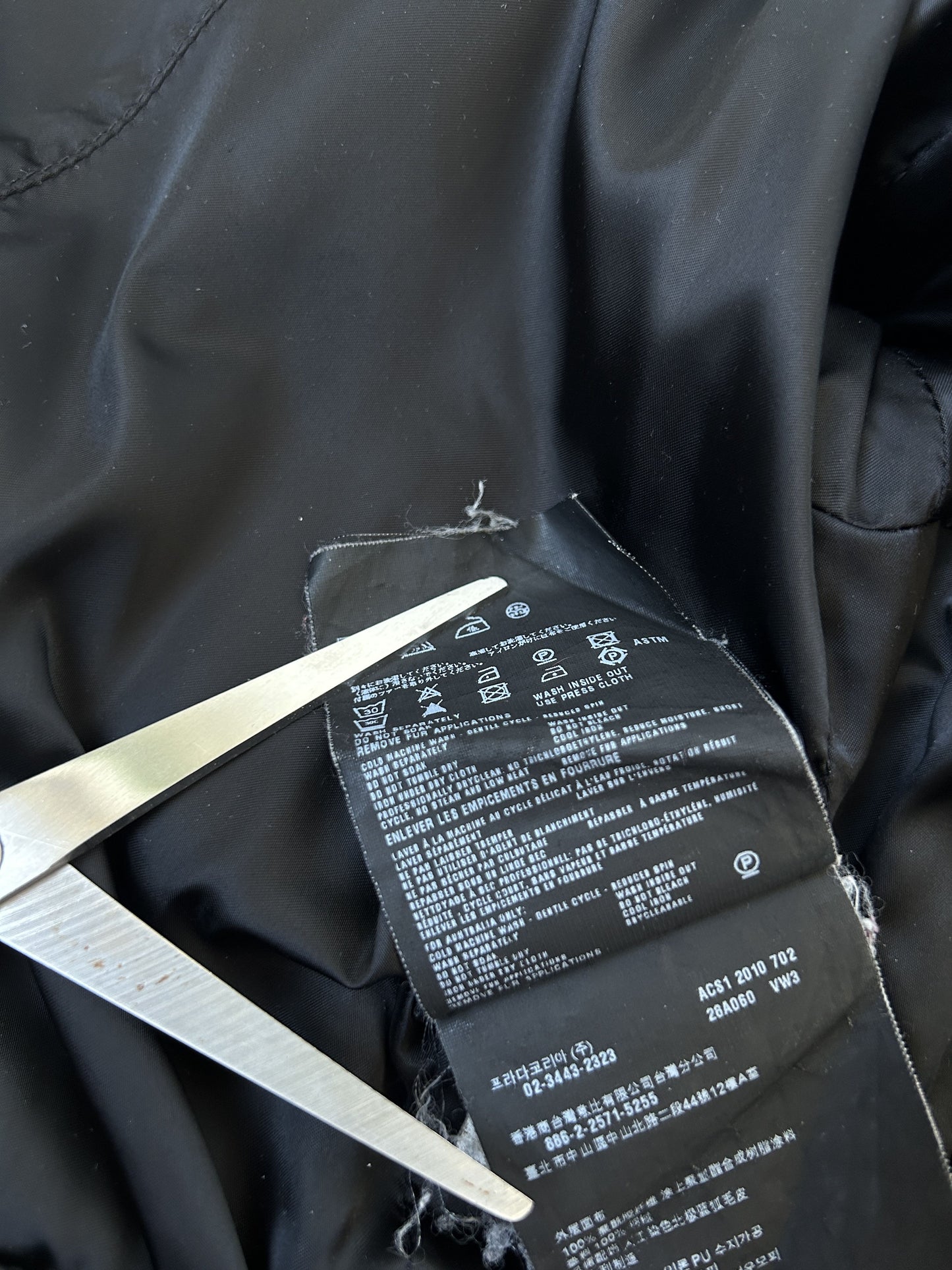 AW2010 Prada sport triangle logo puffer jacket