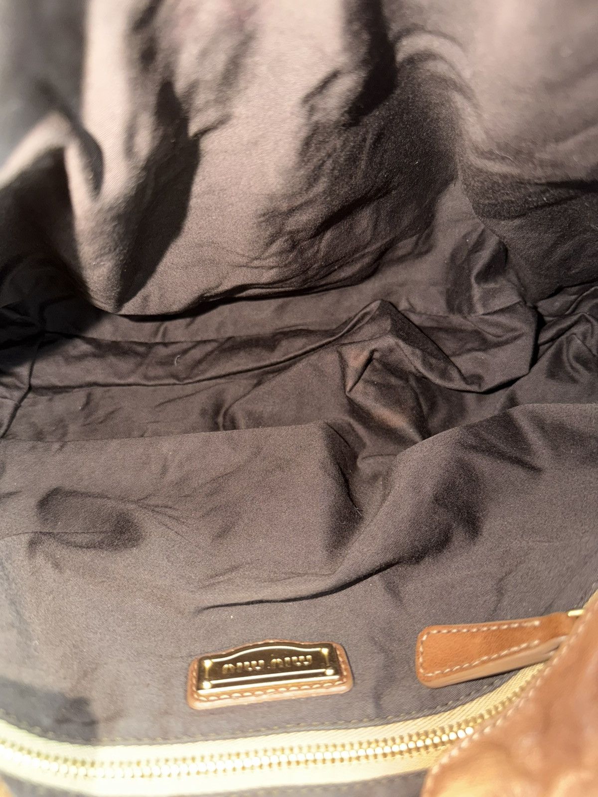 Miu Miu matelasse pleated leather coffer bag in brown
