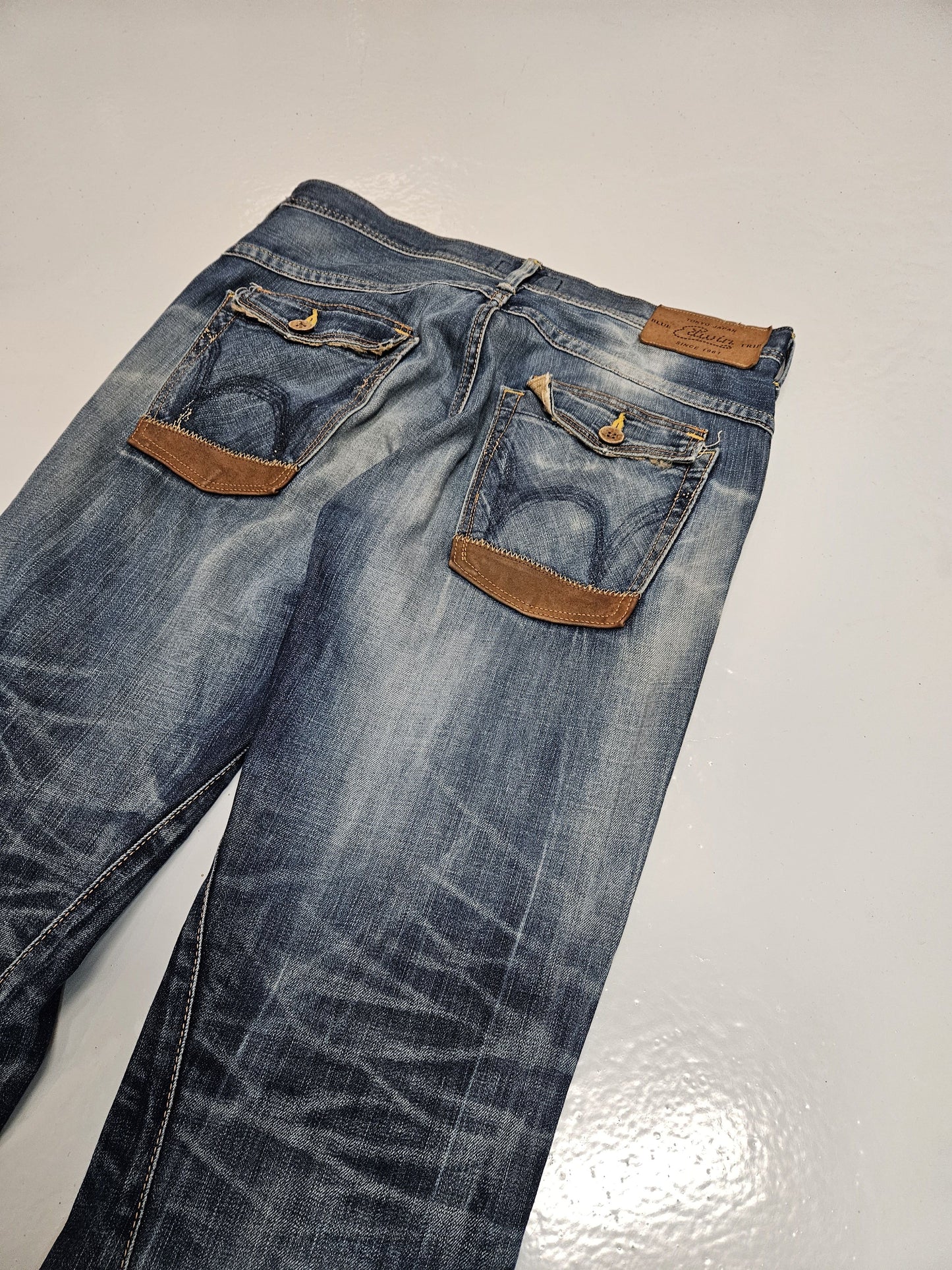 Edwin blue trip distressed washed bootcut denim