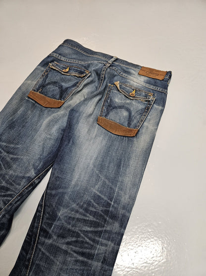 Edwin blue trip distressed washed bootcut denim