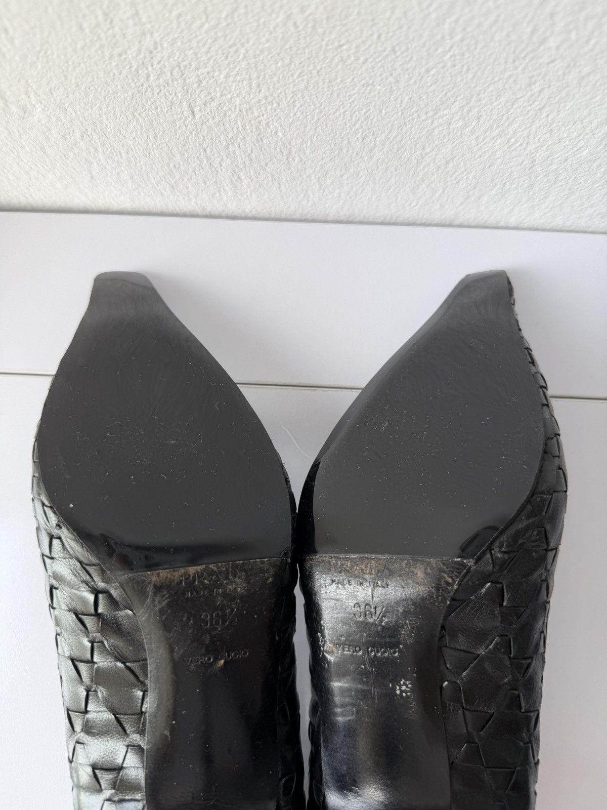 Prada woven leather long toe pumps with bow