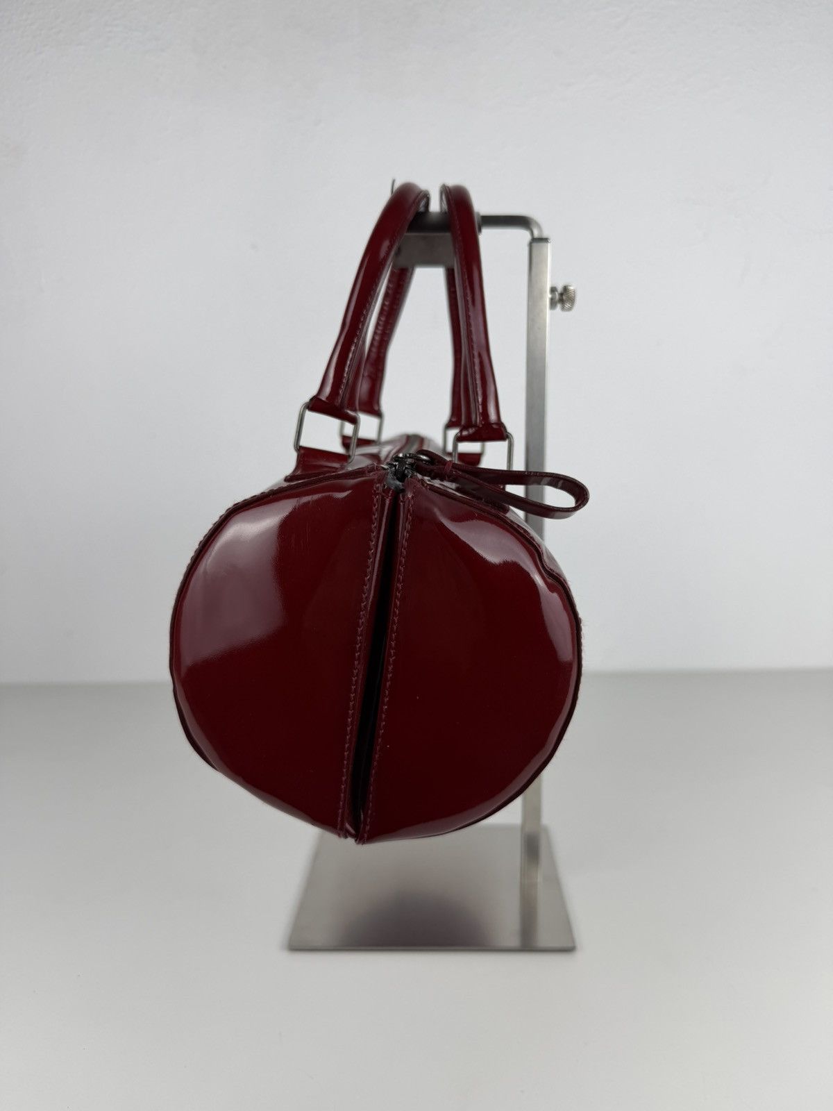 Vintage 90s Miu Miu patent leather cylindrical handbag