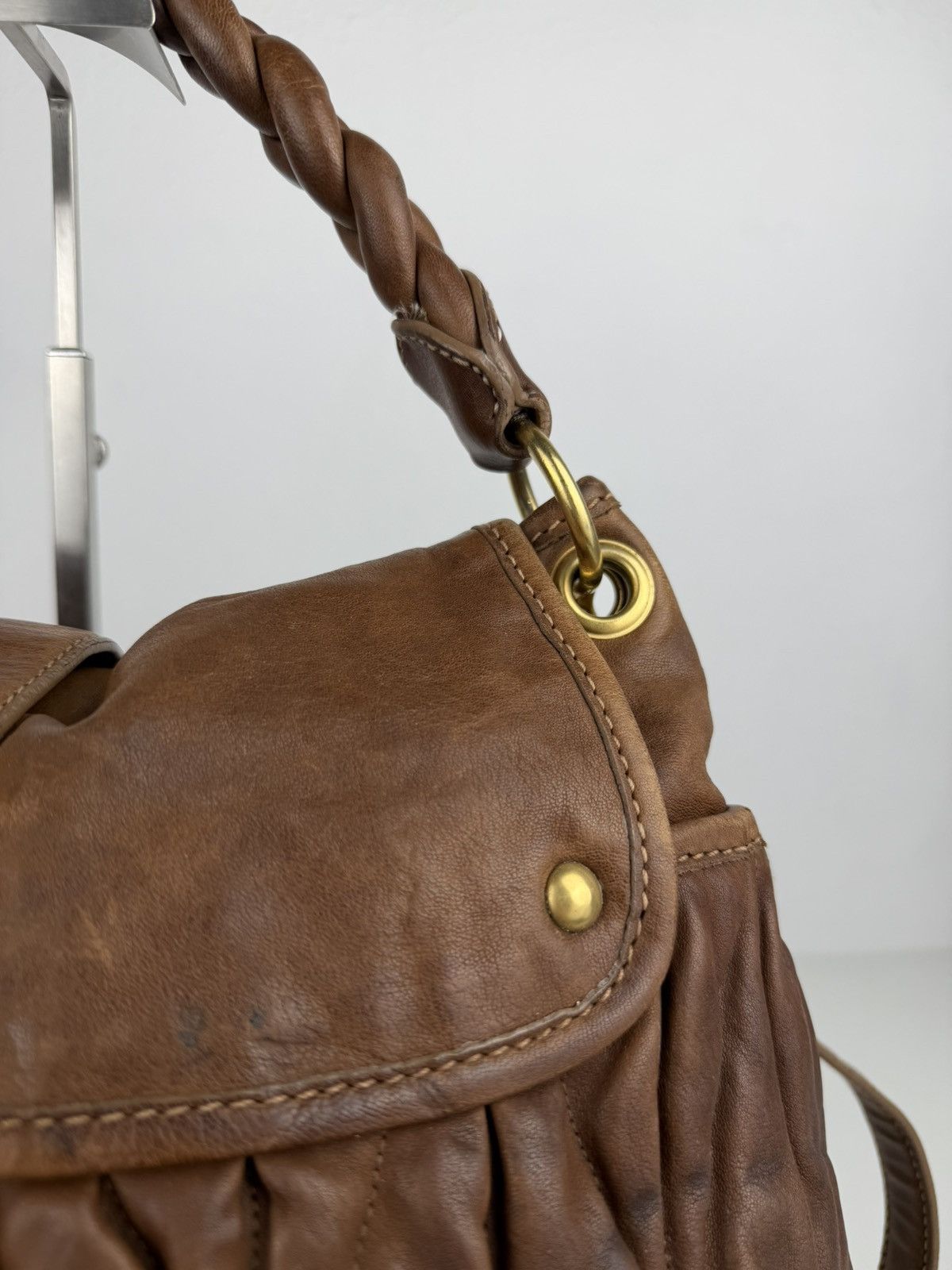 Miu Miu matelasse pleated leather coffer bag in brown