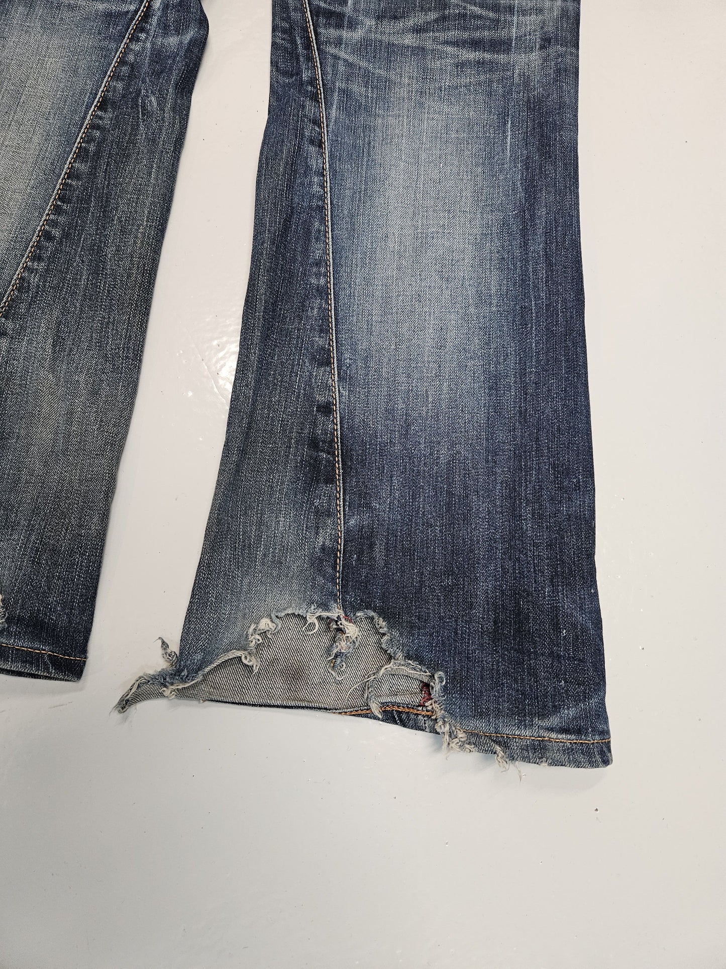 Edwin blue trip distressed washed bootcut denim