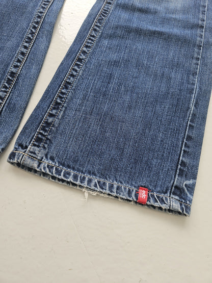 Vintage distressed bootcut low waisted denim