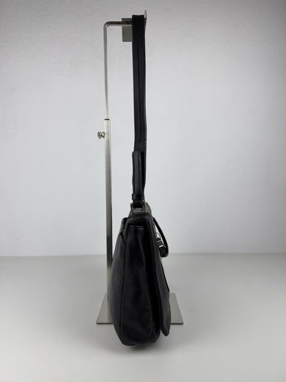 Vintage Prada embossed logo leather shoulder bag
