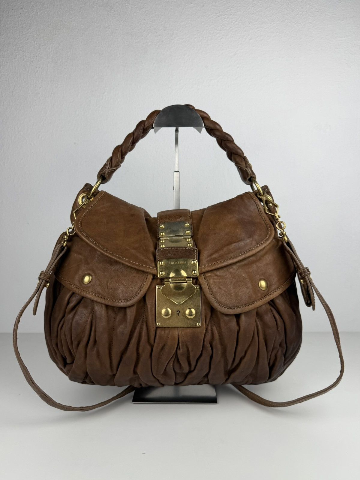 Miu Miu matelasse pleated leather coffer bag in brown