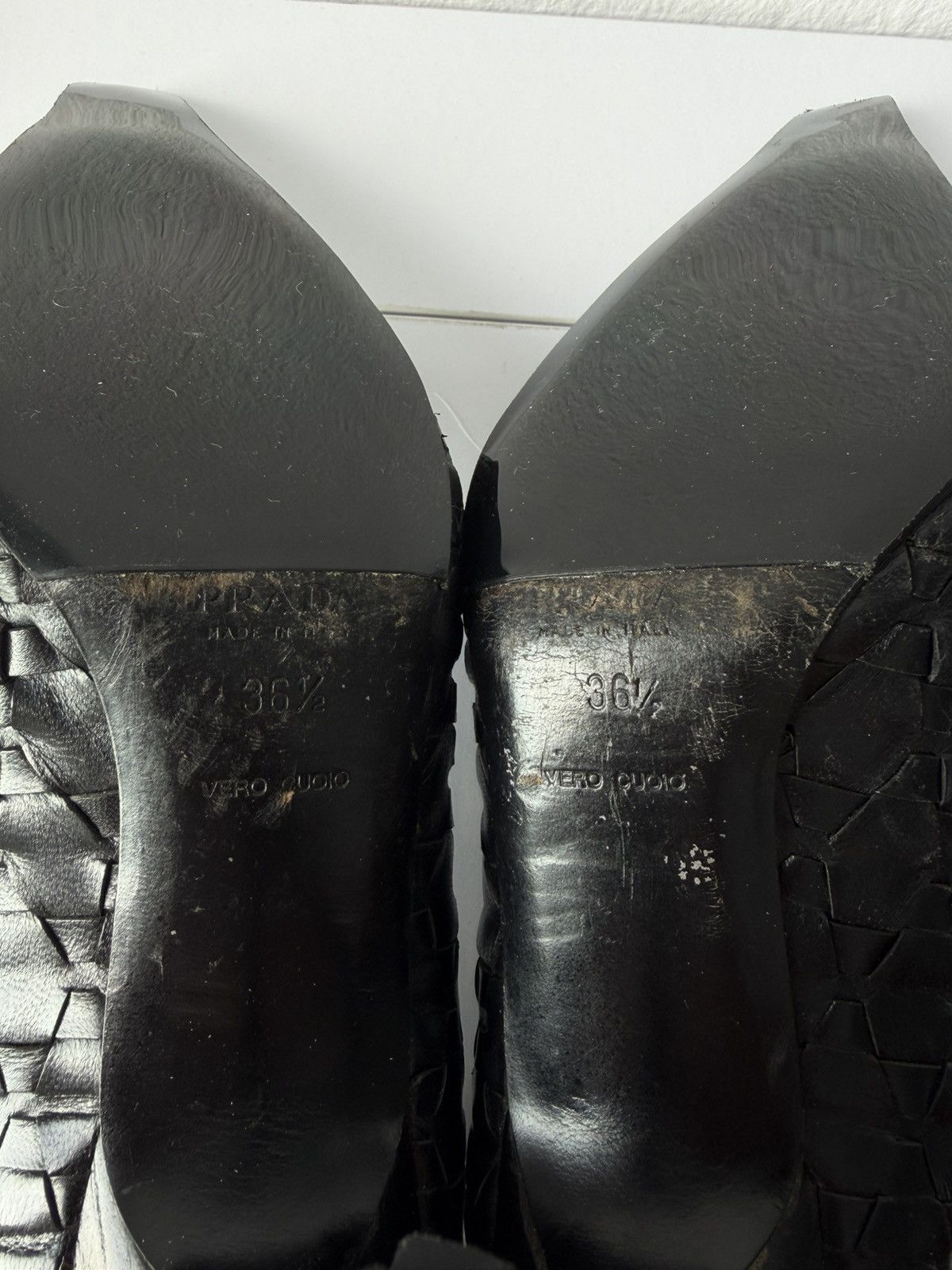 Prada woven leather long toe pumps with bow