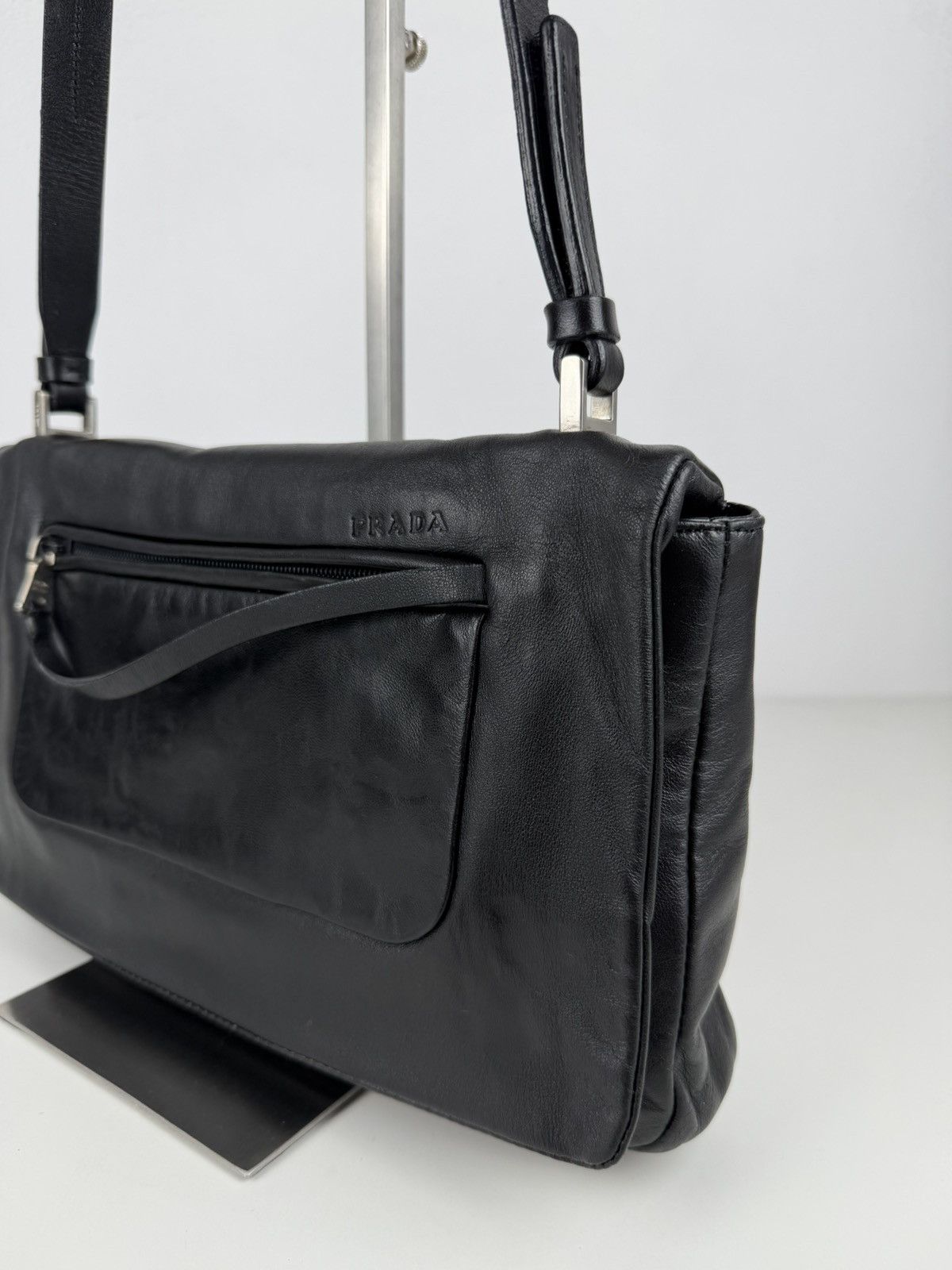 Vintage Prada embossed logo leather shoulder bag
