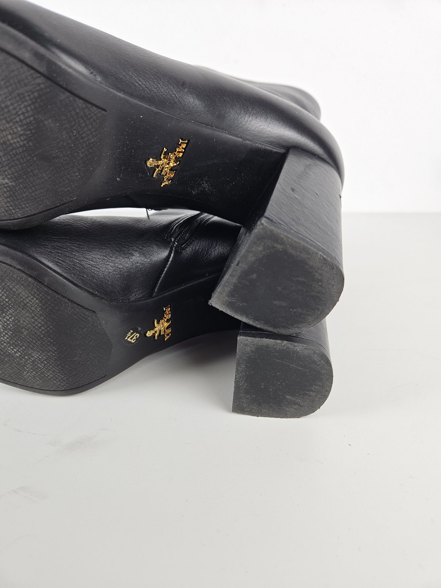 Prada calf leather side zip block heel ankle boots