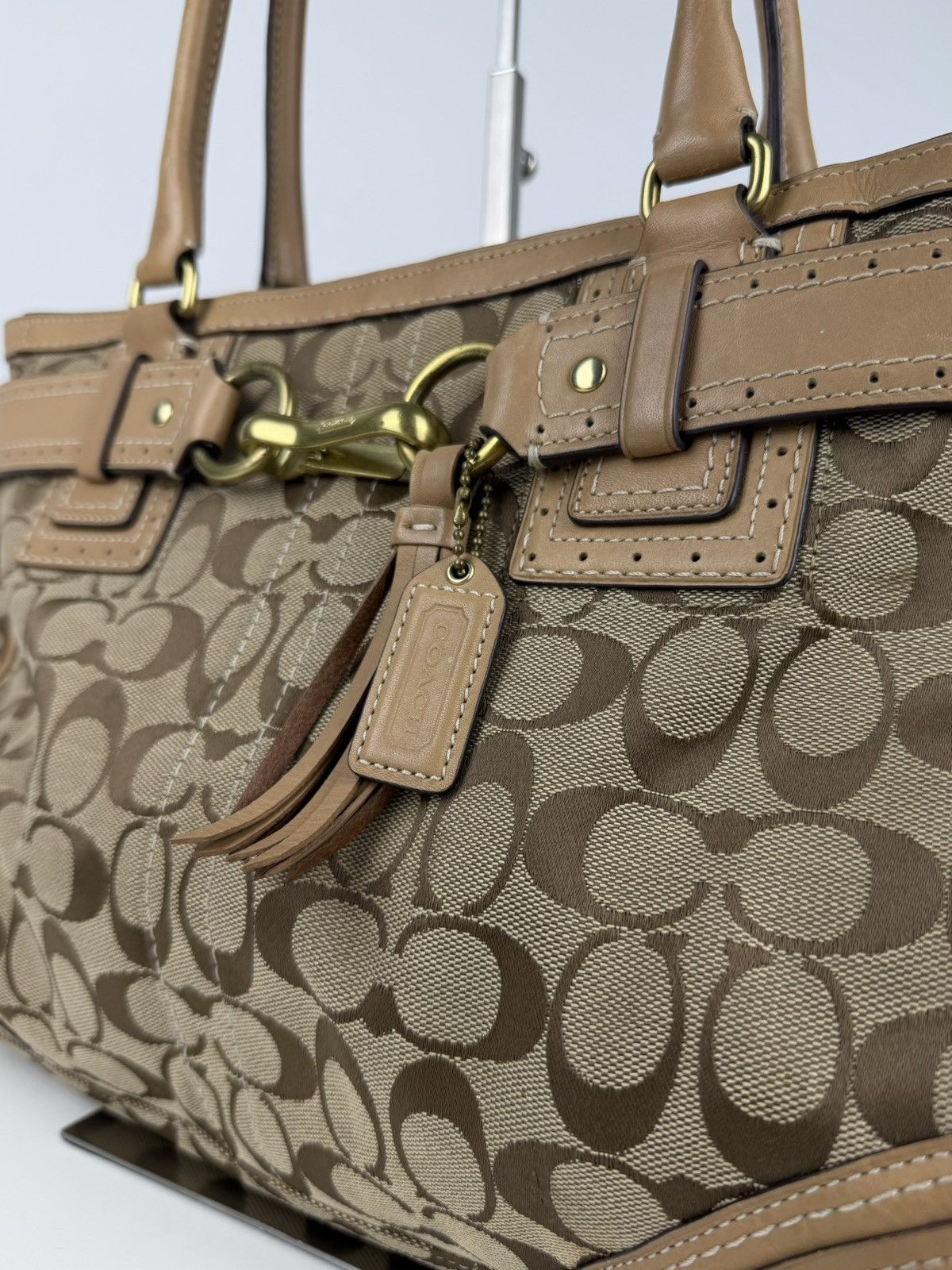 Coach signature leather canvas tassel tote bag