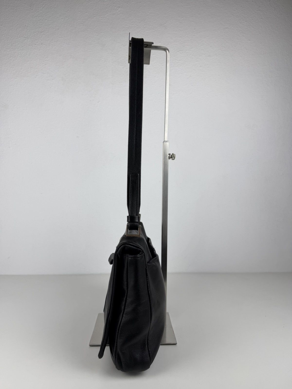 Vintage Prada embossed logo leather shoulder bag