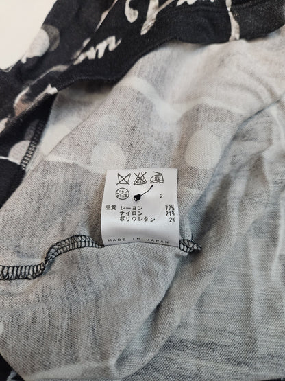Jean Paul Gaultier reneissance woman & polka dot cardigan