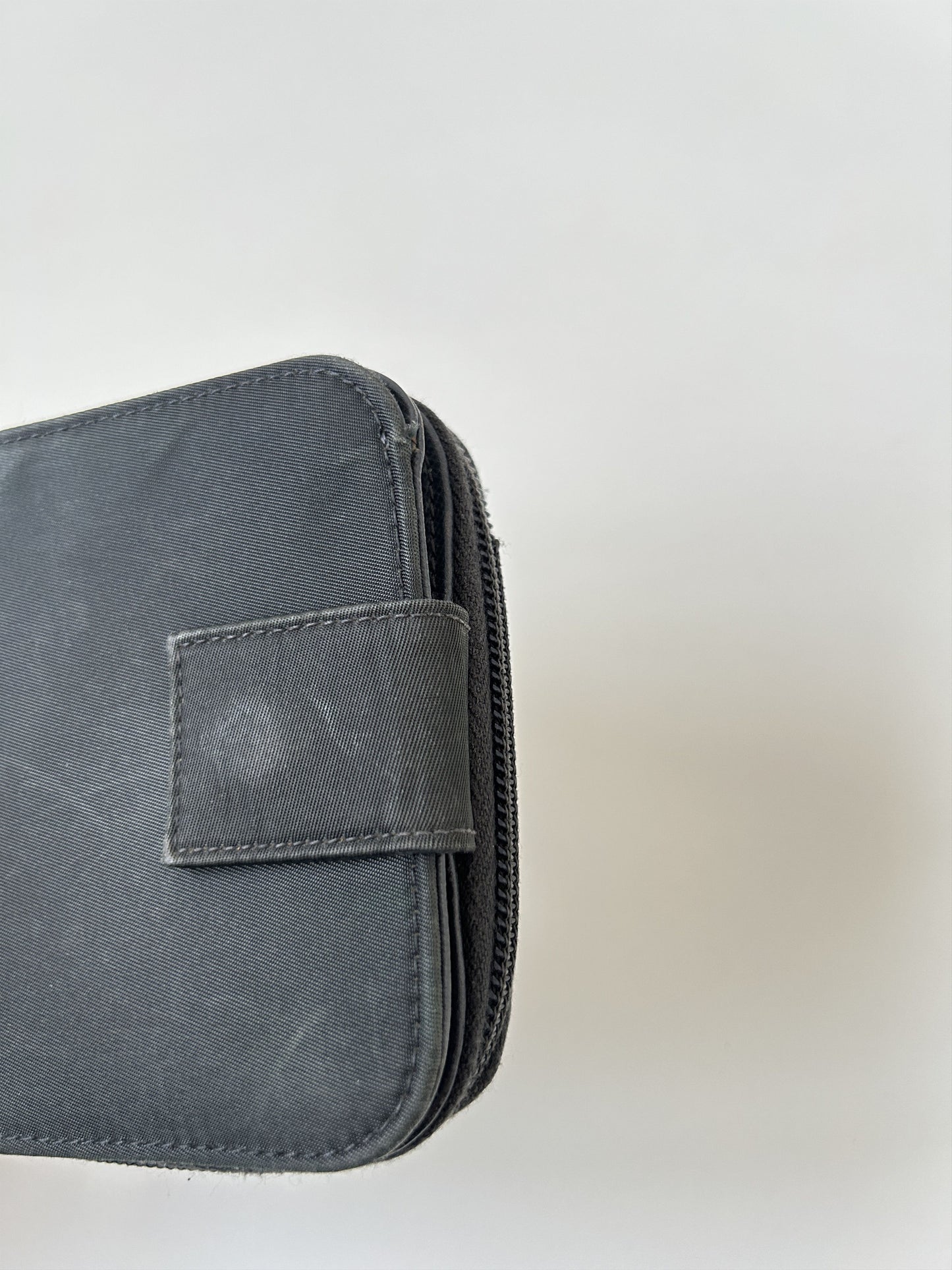 Prada nylon and saffiano leather triangle logo zip wallet