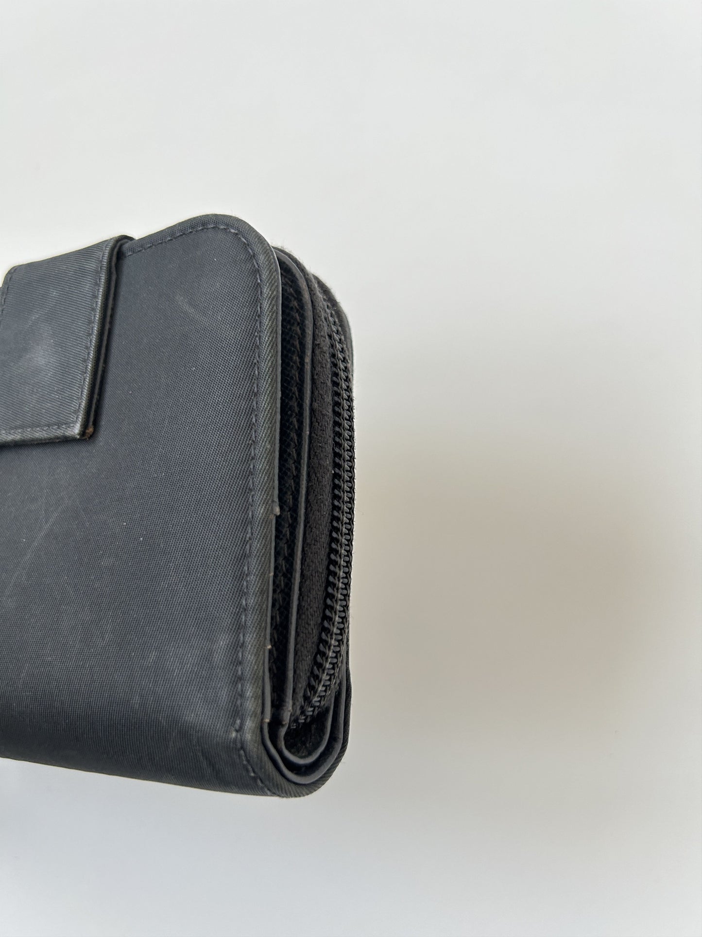 Prada nylon and saffiano leather triangle logo zip wallet