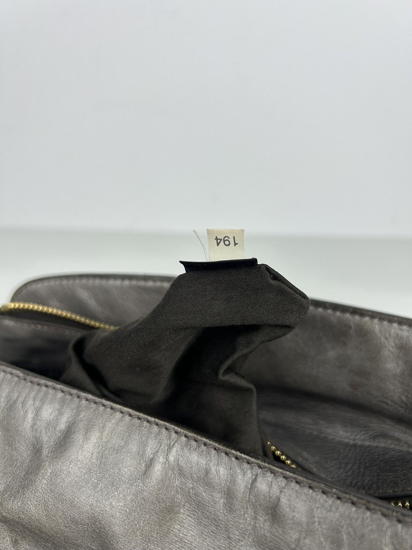 Miu miu vitello bow bag in gray with locket