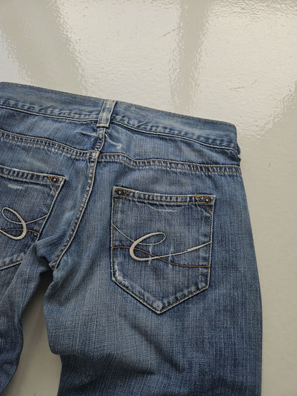 Vintage distressed bootcut low waisted denim