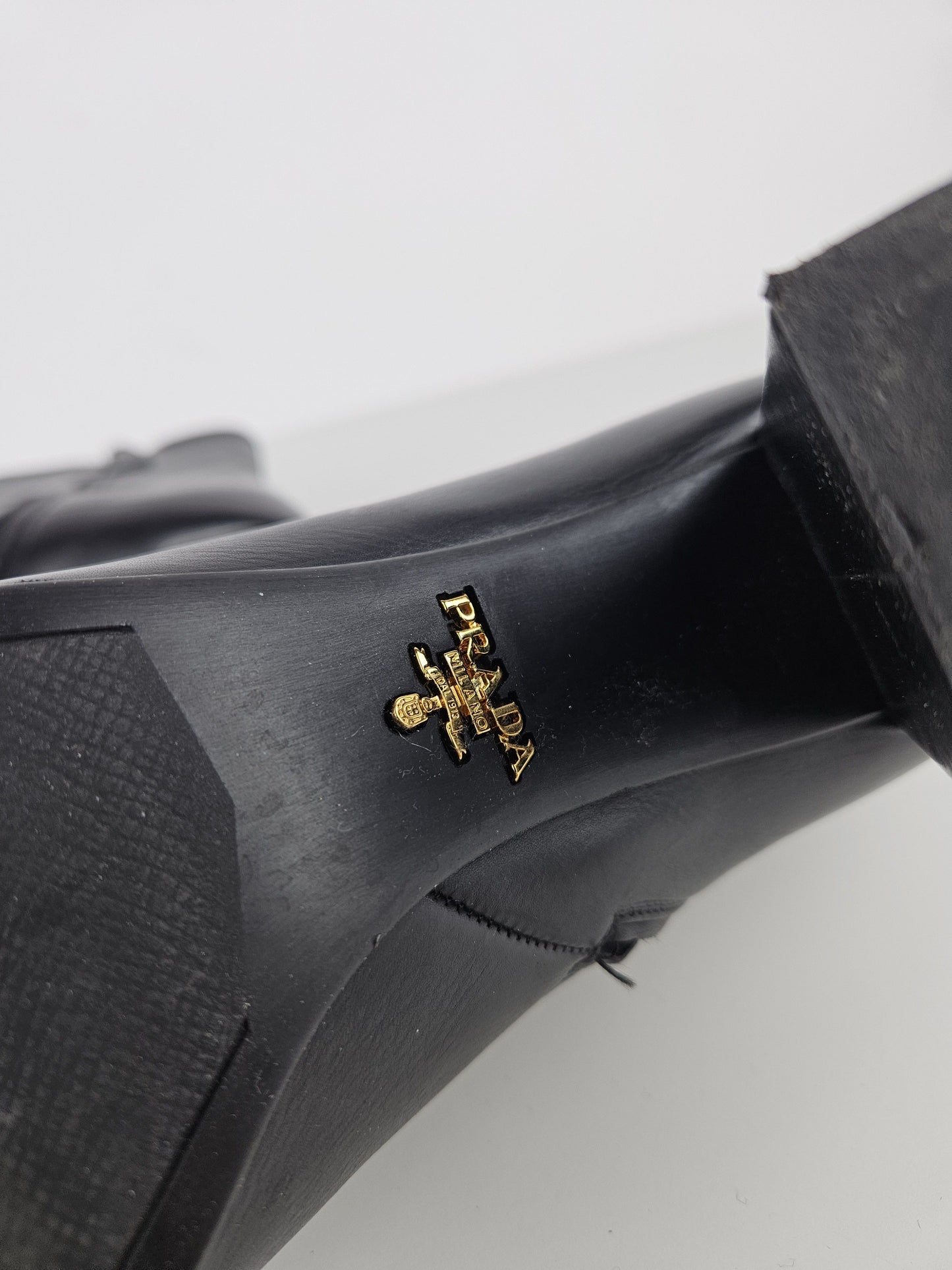 Prada calf leather side zip block heel ankle boots