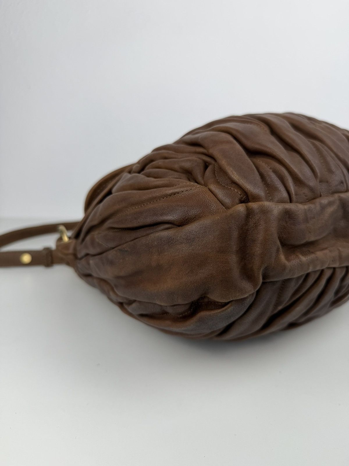 Miu Miu matelasse pleated leather coffer bag in brown