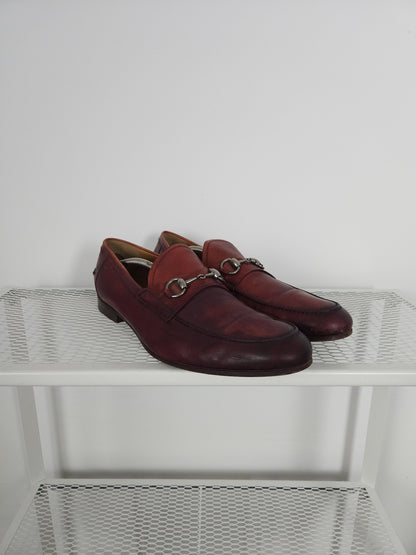 Gucci leather horsebit loafers in distressed red
