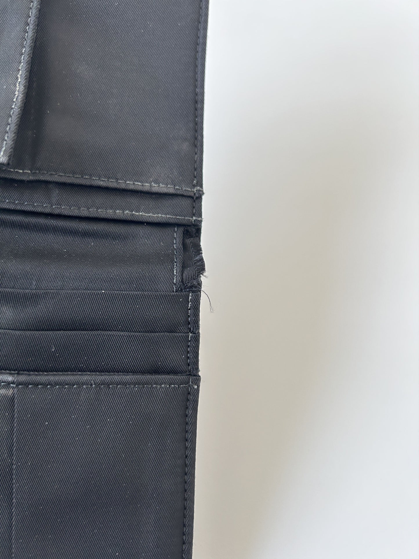 Prada triangle logo nylon bifold wallet