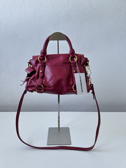 Vintage y2k miu miu vitello bow bag in pink