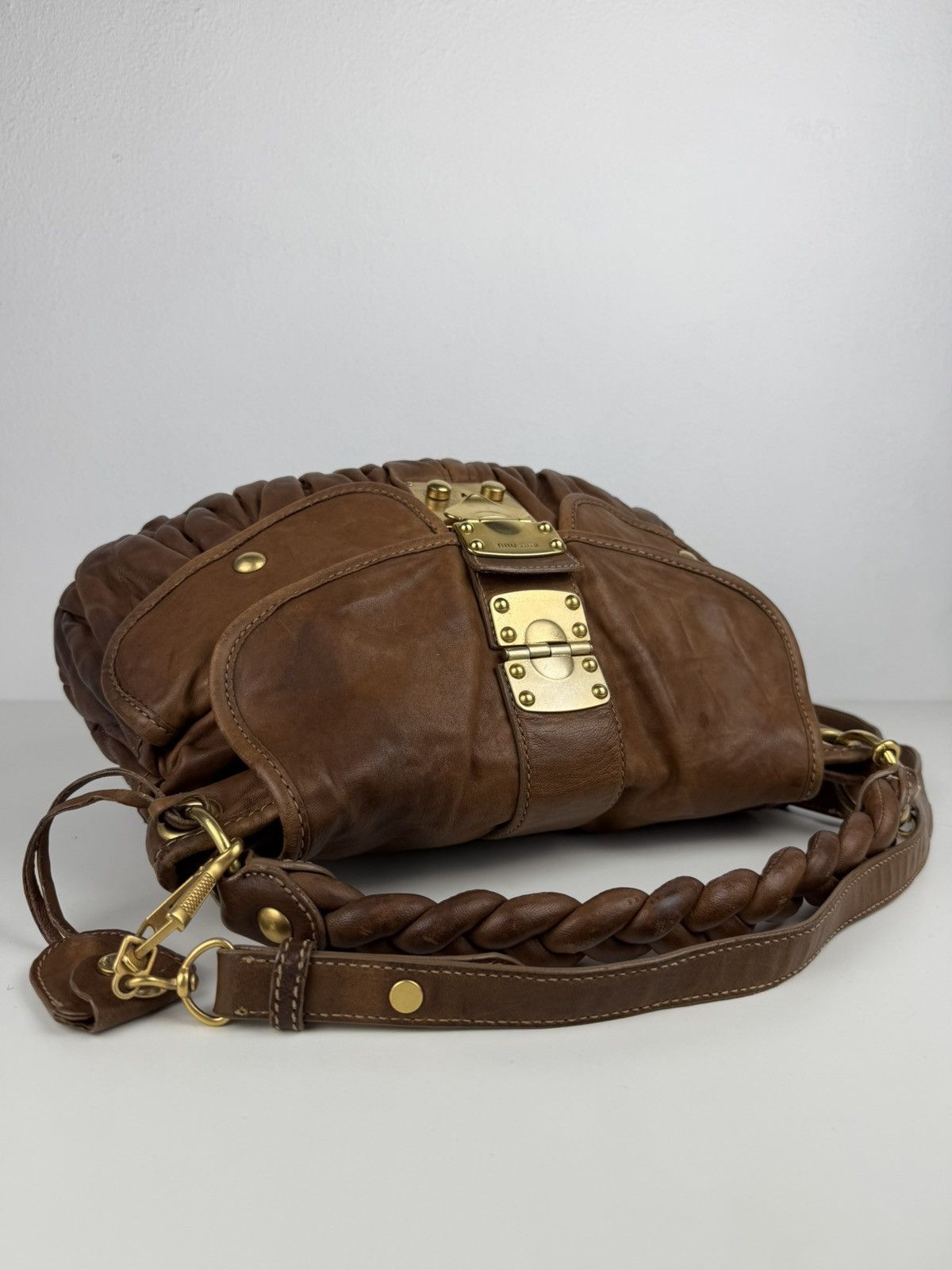 Miu Miu matelasse pleated leather coffer bag in brown
