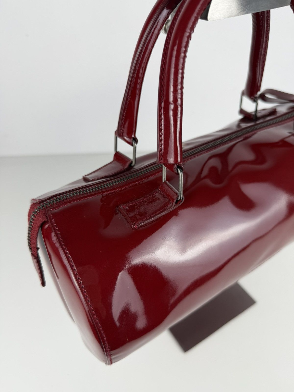 Vintage 90s Miu Miu patent leather cylindrical handbag