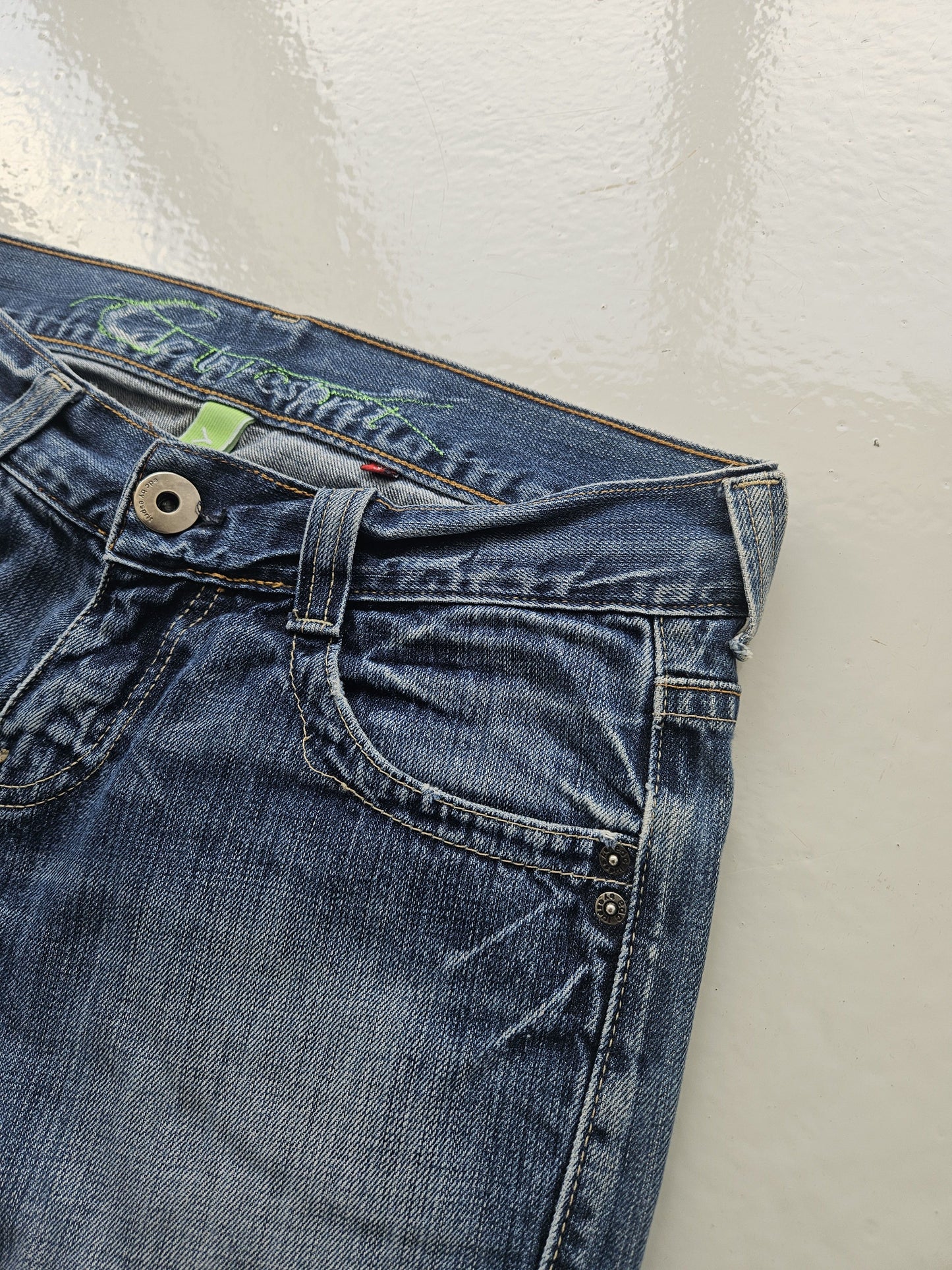 Vintage distressed bootcut low waisted denim