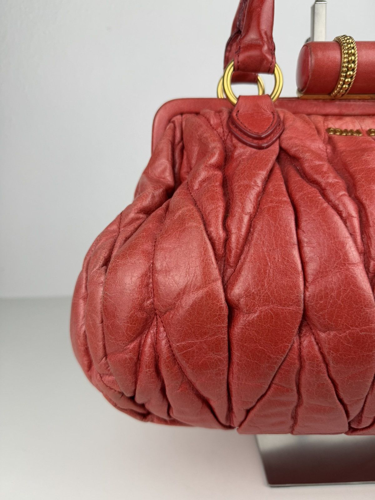 Miu Miu matelasse pleated leather handbag