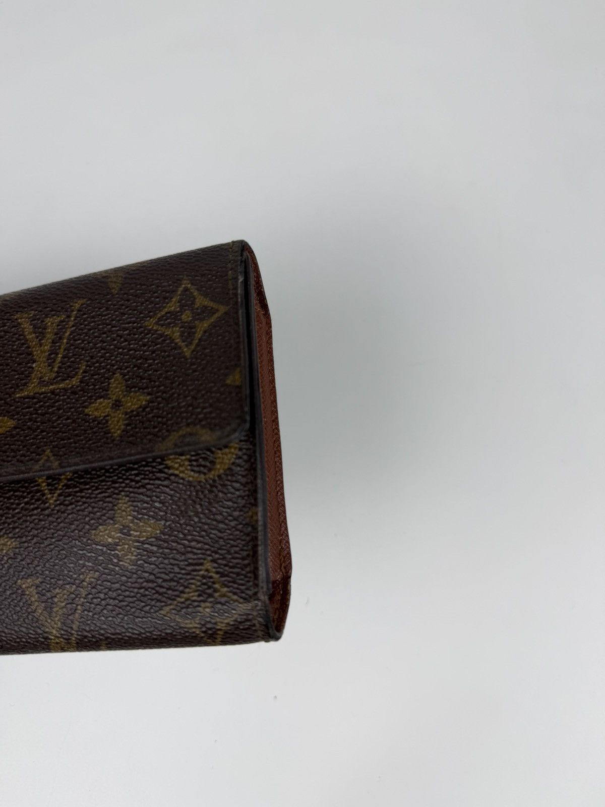 Louis Vuitton porto tresor international trifold wallet