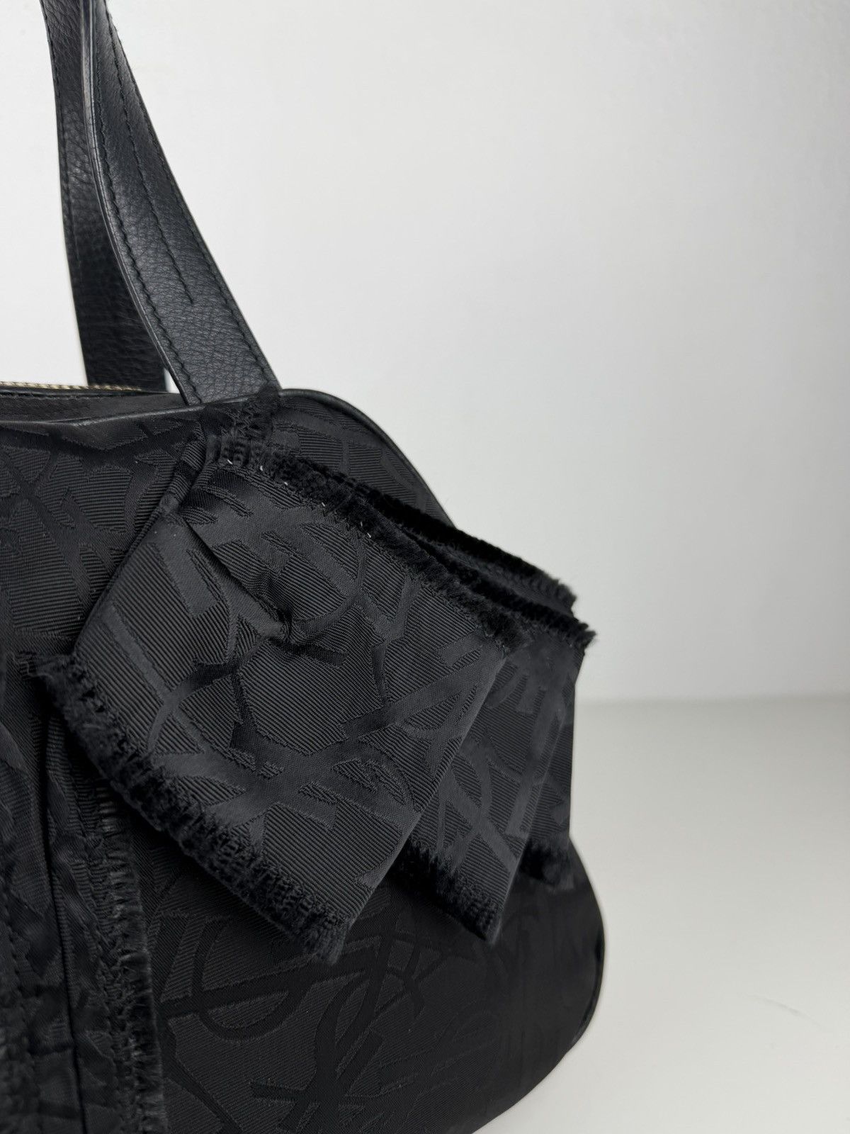 YSL Rive Gauche monogram obi bow bowler bag